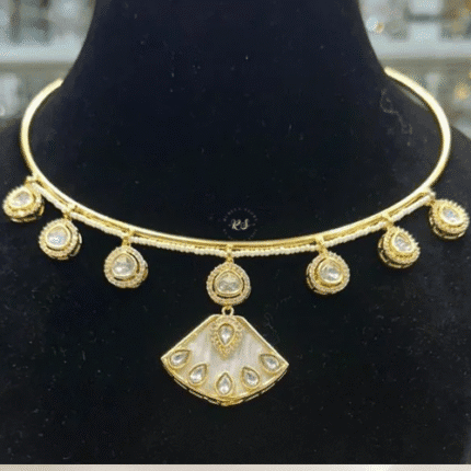 Rubela Store’s Elegant Mosonite Set with Meenakari work – Radiance Redefined