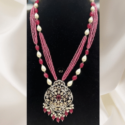 Rubela Store Pink Kundan Set with A.D. Work and Elegant Pink Mala