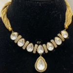 Rubela Store Regal Radiance Gold-Polish Kundan Mosonite Set for Timeless Elegance