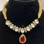 Astonishing Gold-polish Red Kundan Mosonite set